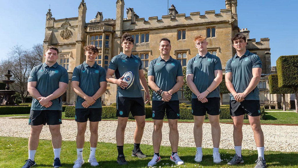 A photo of (from left) Oscar Thomas, James Linegar, Jack Harrison, Johann van Graan, Alex Ridgway and Sam Winters standing outside Farleigh House. 